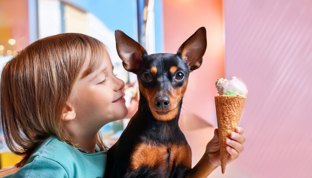 Pinscher Miniatura en una heladería con un niño 